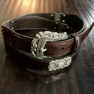 Vintage 1995 brown leather Fossil belt with silver-tone conchos